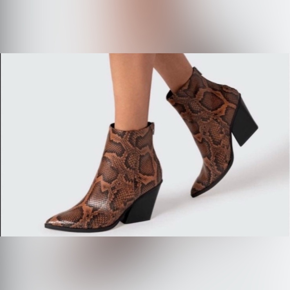 Dolce Vita Snakeskin Ankle Booties.